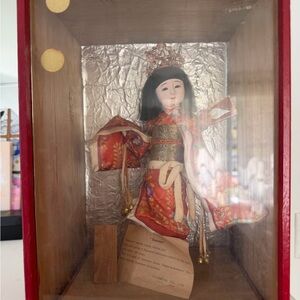 Traditional Japanese Doll in Red Kimono